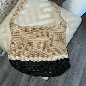 Lightly used crocheted sack cross body purse